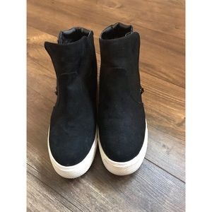 Black sneakers wedges